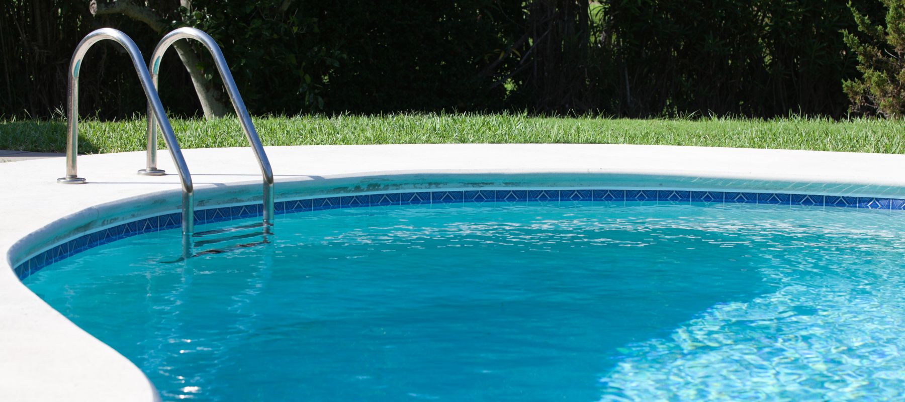 pool with a rail for easy entry and exit